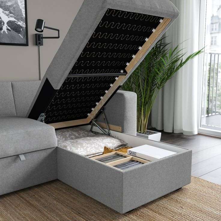 Homes & Luxury grey storage ottoman sofa with lift-up seat and hidden compartment for books and cushions
