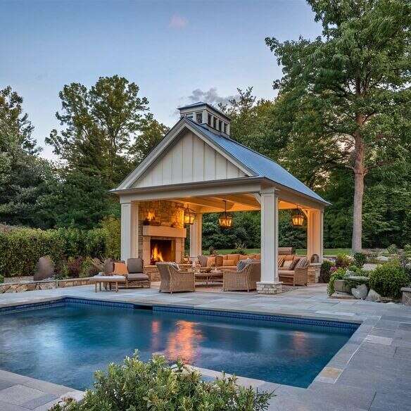 Farmhouse-style modern pool house with rustic wooden beams and modern trim