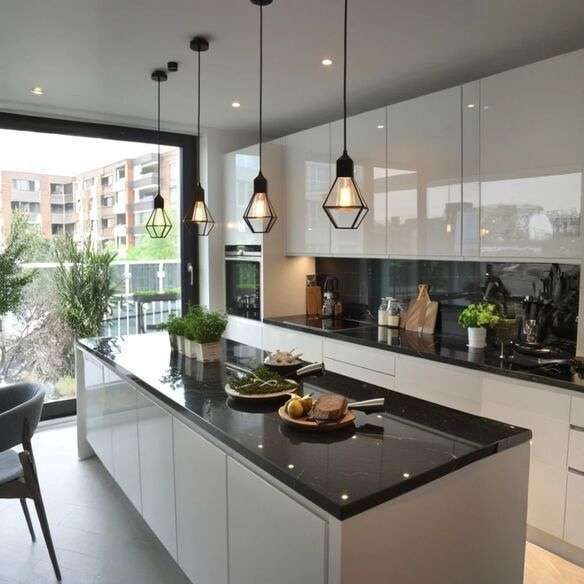 Modern brass pendant lights hanging over a kitchen island with marble countertops