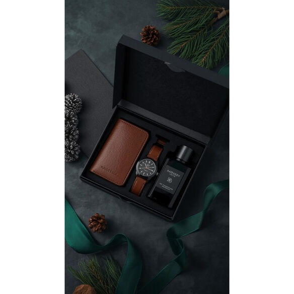 Christmas gift ideas for him including leather wallet, watch, whiskey set, and tech gadgets